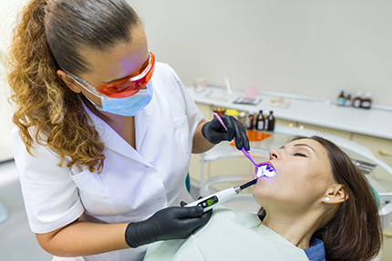 Plum Dental Associates | Root Canals, Oral Cancer Screening and Dental Bridges
